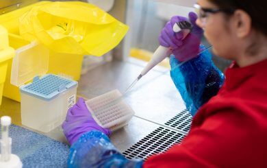 Women Scientist Taking Samples in Lab