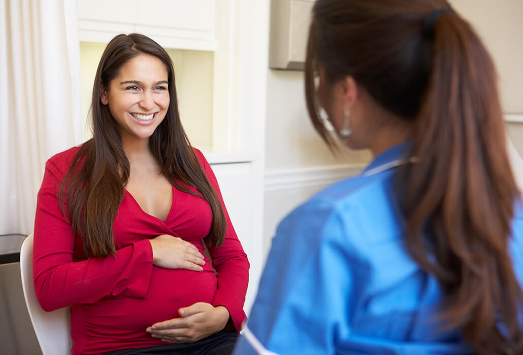 Pregnant Woman Meeting with Nurse