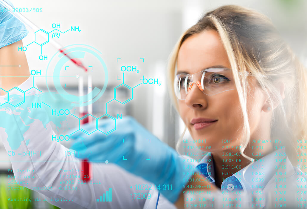 Young attractive female scientist researching in the laboratory